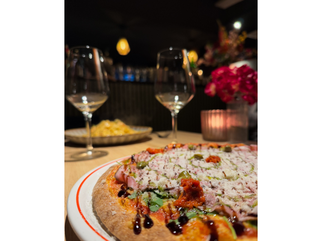 Restaurant Sapore Vero Pizza proscuitto con rucola